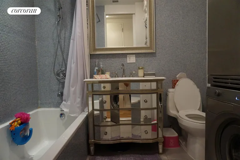 New York City Real Estate | View 233 Kent Avenue, 3 | Second Bathroom (ASKO stacked W/D) | View 9