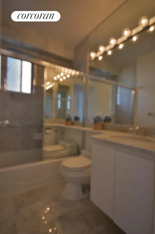 New York City Real Estate | View 45 East 25th Street, 33A | Sparkling white marble bath! | View 5