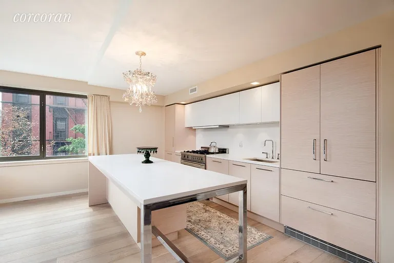 New York City Real Estate | View 101 West 87th Street, 305 | Modern open windowed kitchen w/wine cooler | View 2