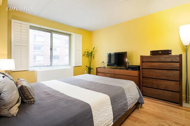New York City Real Estate | View 555 West 23rd Street, S7M | Queen-sized bedroom w/courtyard views | View 3