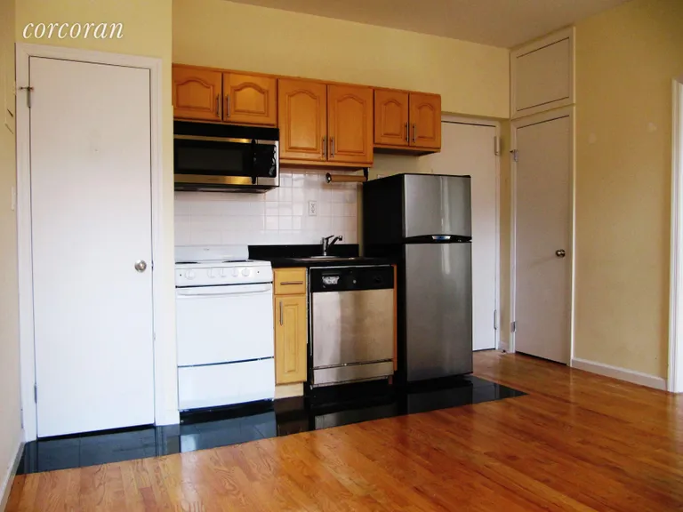 New York City Real Estate | View 11 Varick Street, 4M | Open kitchen with stainless steel appliances.  | View 3