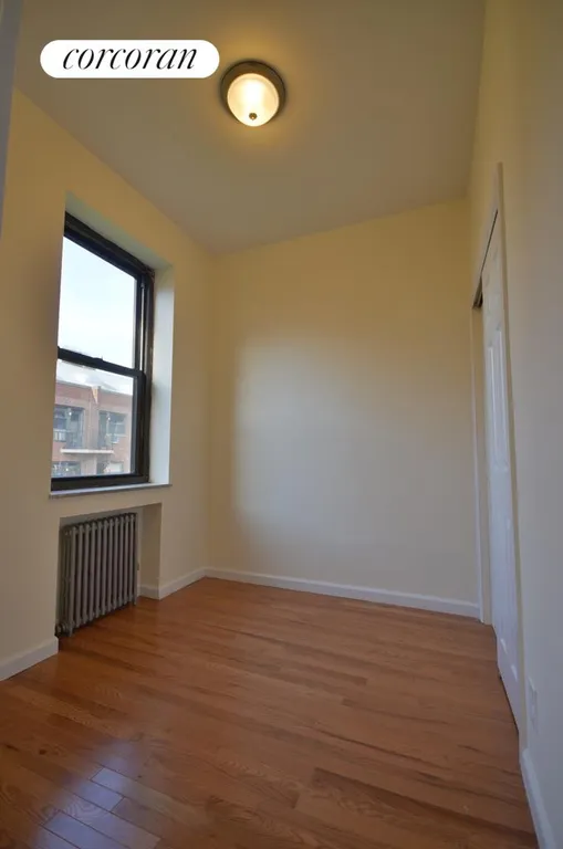 New York City Real Estate | View 206 Thompson Street, 15 | Queen size bedroom with bright south exposure! | View 4