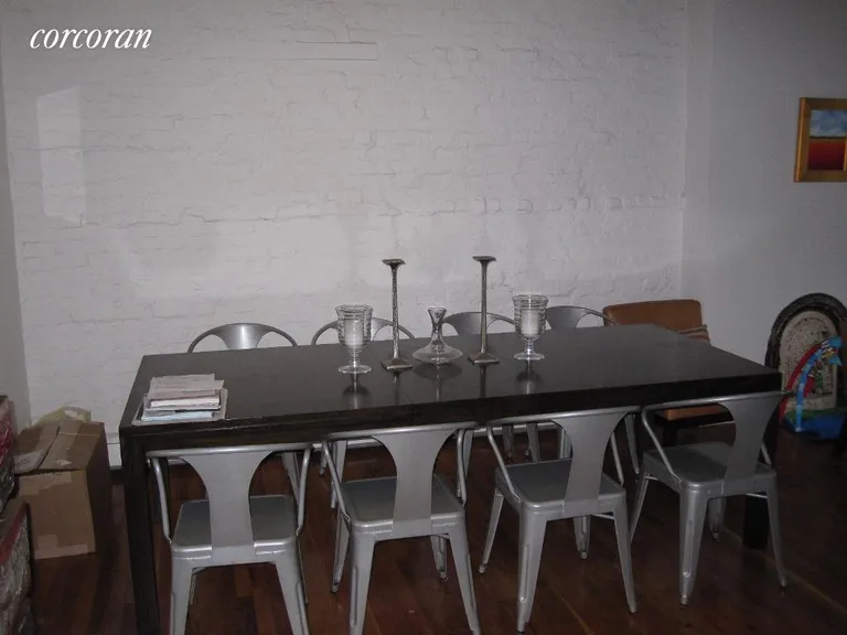New York City Real Estate | View 547 Pacific Street, 2 | Dining area with exposed brick walls | View 3