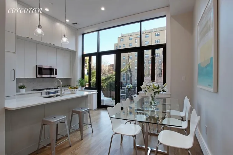New York City Real Estate | View 259 Hoyt Street | Kitchen/Dining leading to Cedar/Steel Deck  | View 2