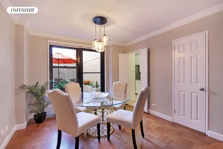 New York City Real Estate | View 301 East 69th Street, 2L | Dining Room opens to private terrace | View 2
