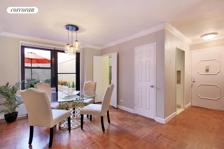 New York City Real Estate | View 301 East 69th Street, 2L | Sun-filled Dining Room and Foyer | View 3