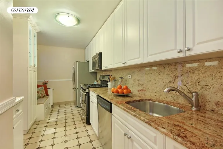 New York City Real Estate | View 301 East 69th Street, 2L | Spacious chef's kitchen with window | View 4