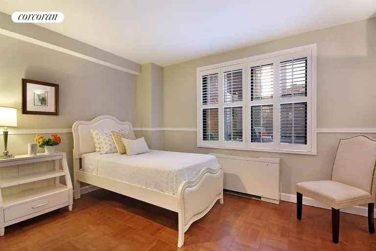 New York City Real Estate | View 301 East 69th Street, 2L | Guest bedroom with lovely terrace views | View 7