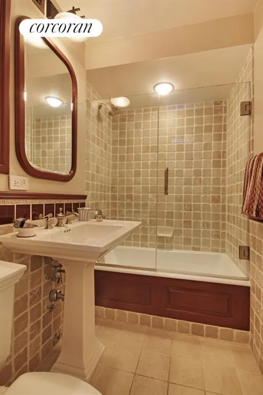 New York City Real Estate | View 301 East 69th Street, 2L | Beautiful guest bathroom | View 8