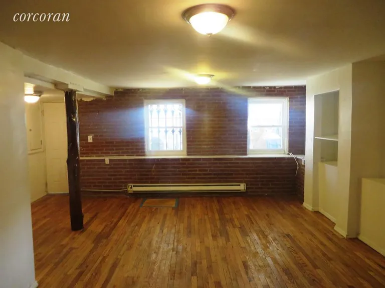 New York City Real Estate | View 69 Woodbine Street, 1 | 2 Beds, 2 Baths | View 1