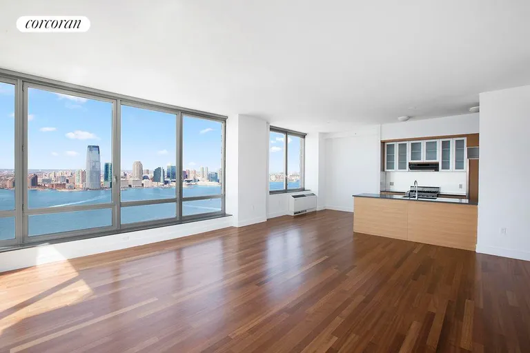New York City Real Estate | View 30 West Street, PH2F | Living Room/Dining Room/Kitchen | View 7