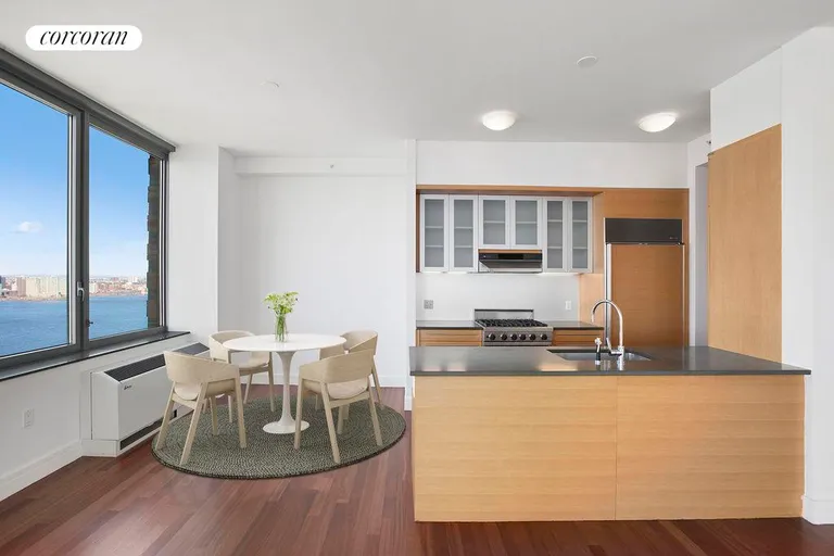 New York City Real Estate | View 30 West Street, PH2F | Dining Room/Kitchen - Virtual Furniture | View 5