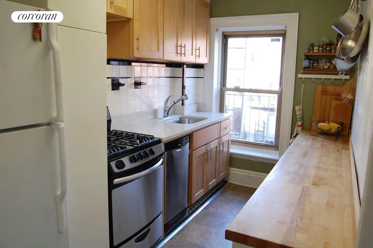 New York City Real Estate | View 305 Vanderbilt Avenue, Top | Brand new countertop, stove, dishwasher, cabinets | View 3