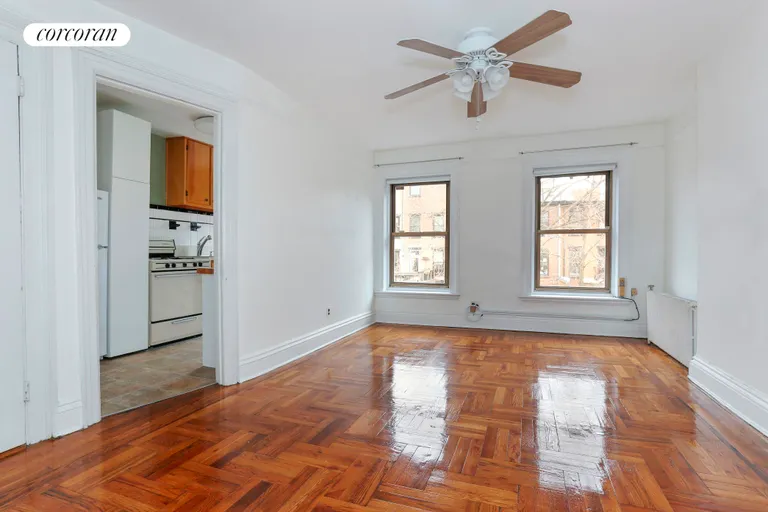 New York City Real Estate | View 305 Vanderbilt Avenue, Top | Living room w/ view of kitchen prior to renovation | View 4