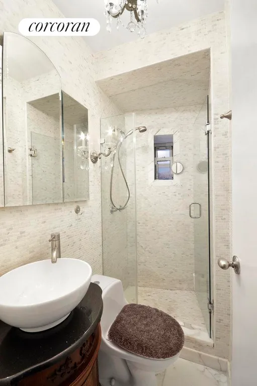 New York City Real Estate | View 321 East 12th Street, 3 | marble bathroom with large shower | View 6