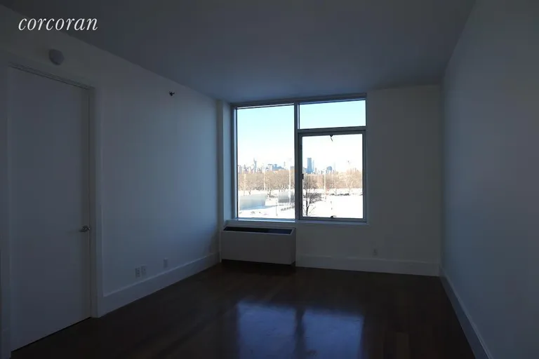New York City Real Estate | View 30 Bayard Street, 4C | Views of McCarren Park & Skyline from Living Room | View 3