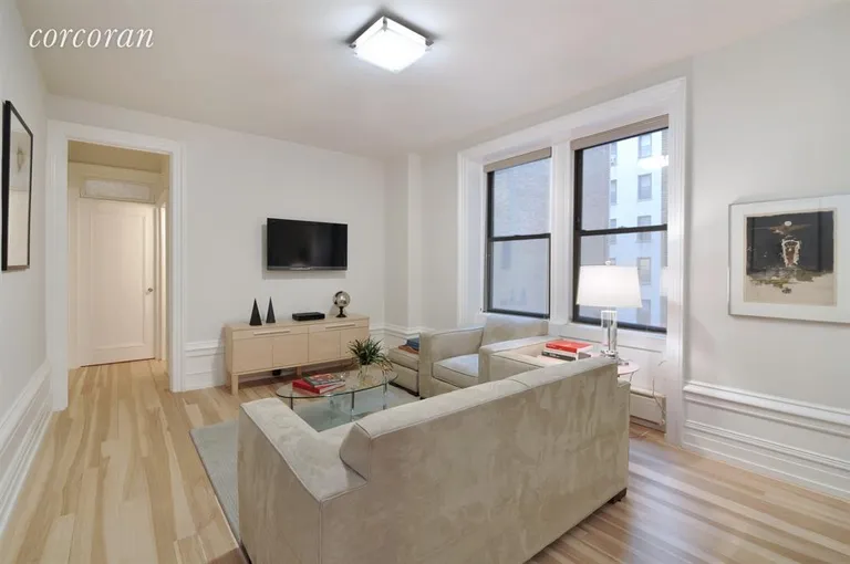 New York City Real Estate | View 255 West 84th Street, 1F | Living Room with Prewar Details | View 2