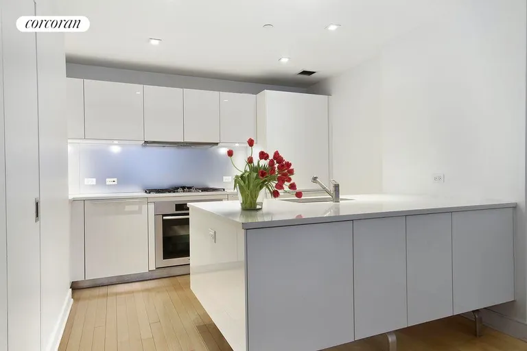 New York City Real Estate | View 5 East 44th Street, 5A | ultra modern and chic kitchen | View 2