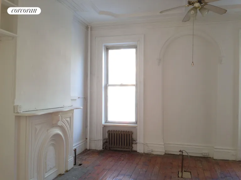 New York City Real Estate | View 181 Bergen Street | Parlor kitchen with mantle w/ origplaster details | View 3