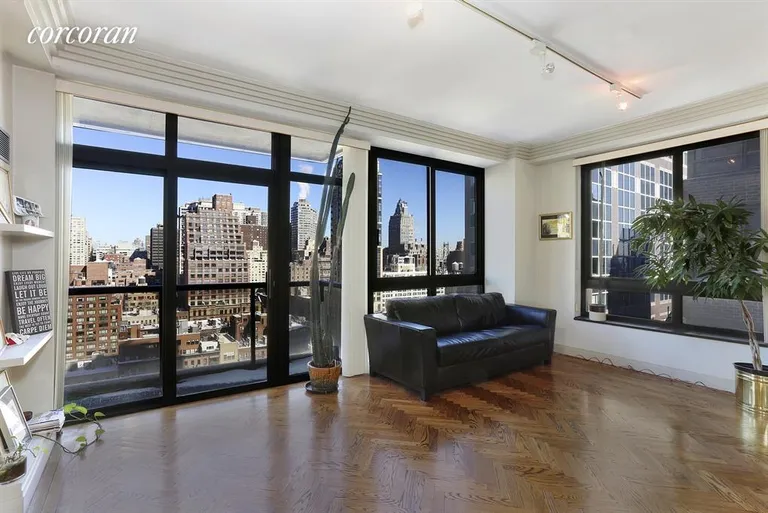 New York City Real Estate | View 100 United Nations Plaza, 20G | Living Room with access to Private Wrap Balcony | View 2