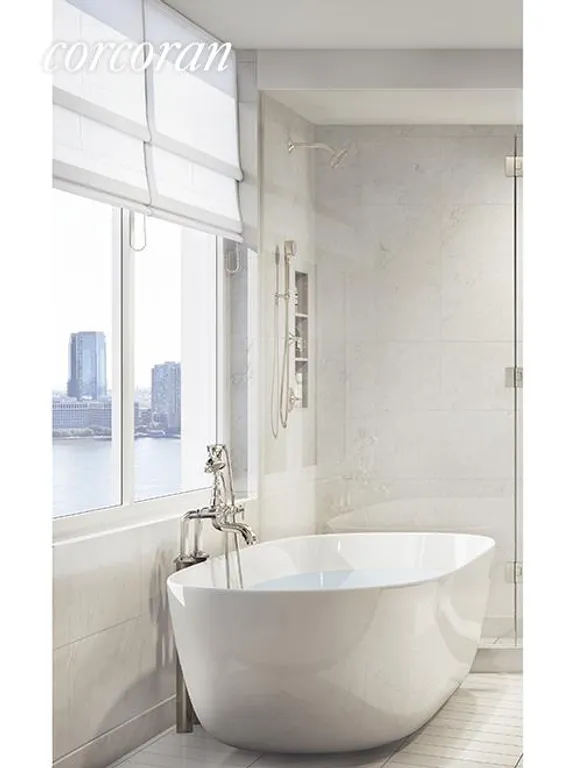 New York City Real Estate | View 212 Warren Street, 18F | Freestanding Tub in Windowed Marble Bath | View 3