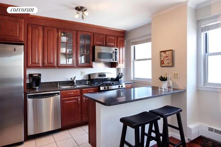 New York City Real Estate | View 191 Willoughby Street, 10G | Kitchen with Breakfast Bar | View 3