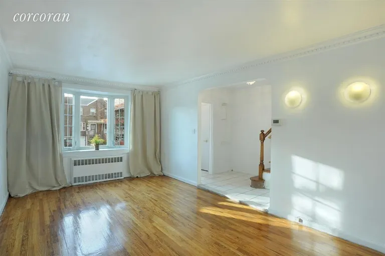 New York City Real Estate | View 1247 East 53rd Street | Large Sunny Living Room w beautiful hardwood floor | View 2