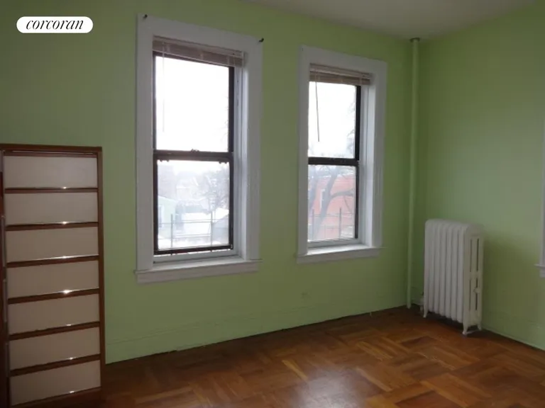 New York City Real Estate | View 1506 Overing Street, 7B | Bedroom with hardwood floors | View 4