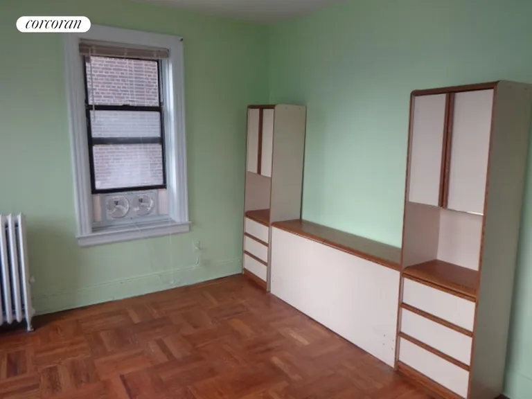 New York City Real Estate | View 1506 Overing Street, 7B | Bedroom with 3 windors | View 5