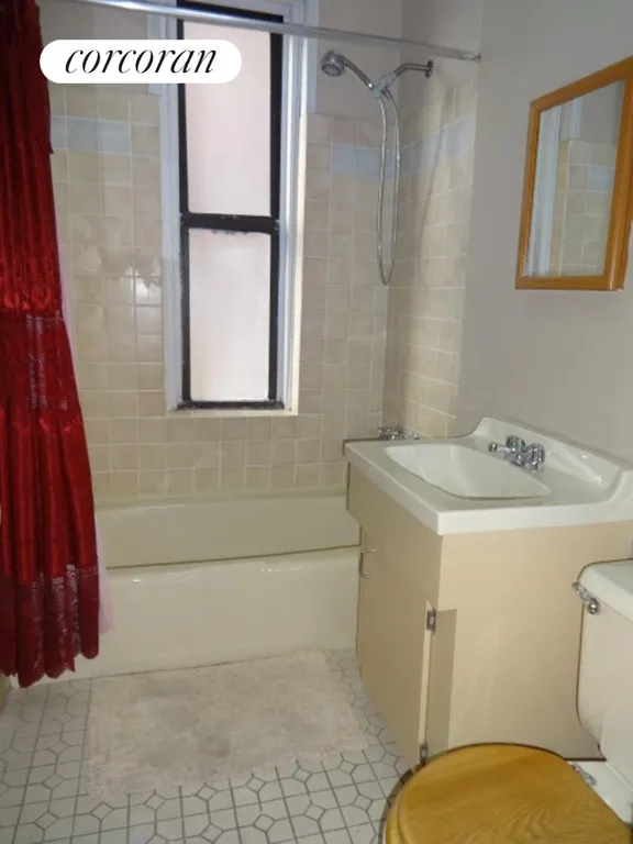 New York City Real Estate | View 1506 Overing Street, 7B | Bathroom with window | View 10