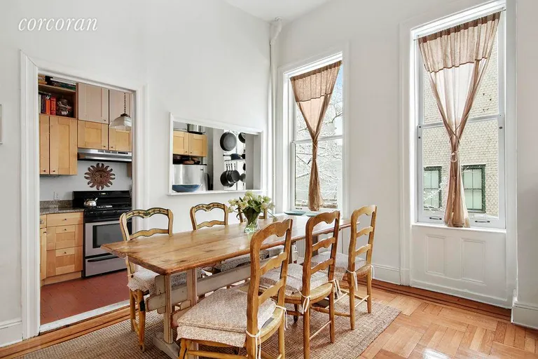 New York City Real Estate | View 99 State Street, 2W | Kitchen has tons of cabinets and opens to dining | View 2