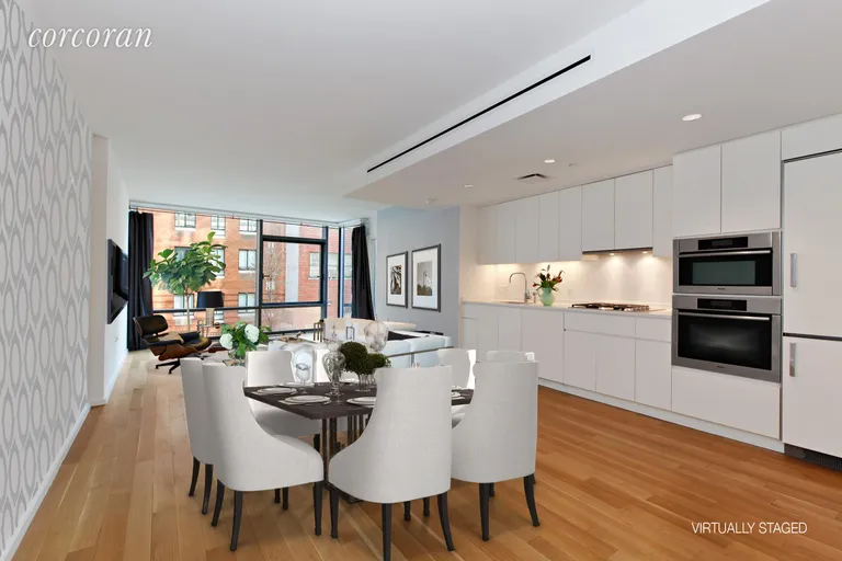 New York City Real Estate | View 425 West 53rd Street, 207 | Dining and living facing south | View 2