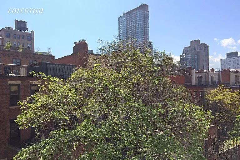 New York City Real Estate | View 8 West 71st Street, 4B | South facing Garden view of other Brownstones. | View 3