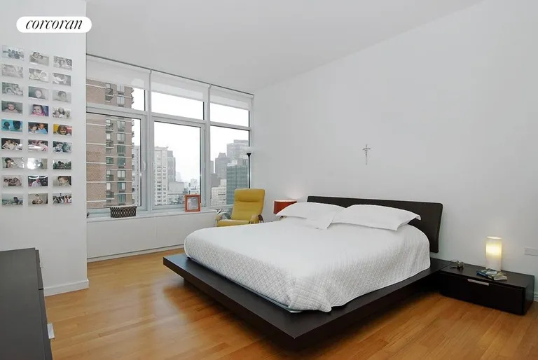 New York City Real Estate | View 310 East 53rd Street, 24B | Master Bedroom with en suite Bath | View 4