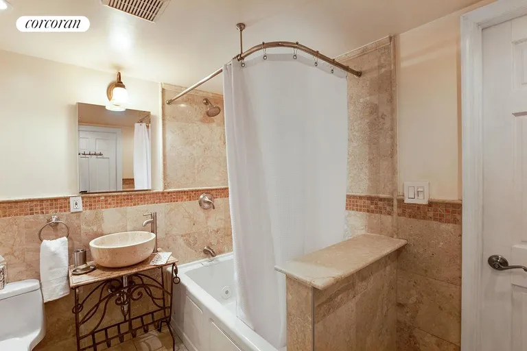 New York City Real Estate | View 123 East 75th Street, 4D | Renovated Marble & Stone Bathroom | View 3
