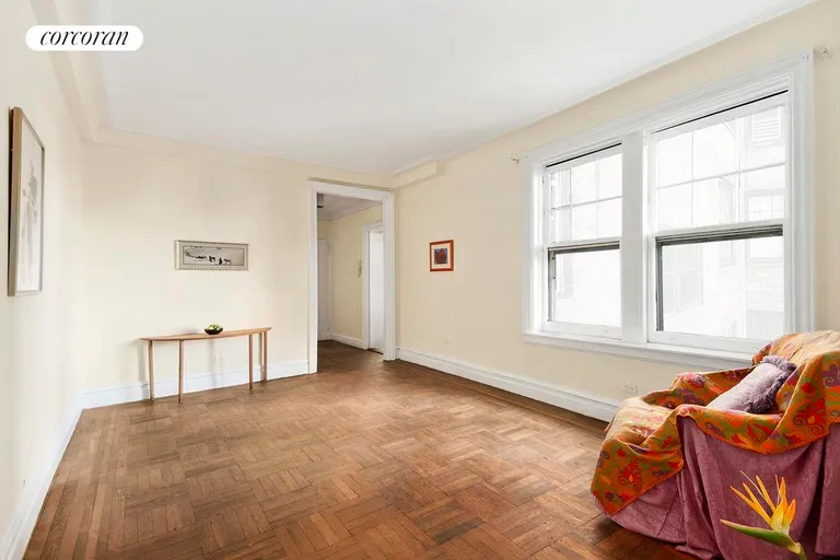 New York City Real Estate | View 15 West 11th Street, 6A | Living room with original hardwood floors. | View 4
