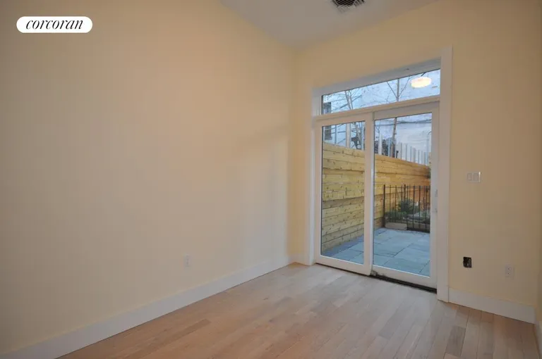 New York City Real Estate | View 67 Greene Avenue, 1 | 2nd Bedroom with glass doors to patio | View 8