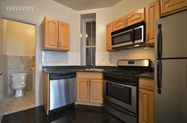 New York City Real Estate | View 11 Varick Street, 2F | Brand new kitchen with dishwasher and microwave. 
 | View 2