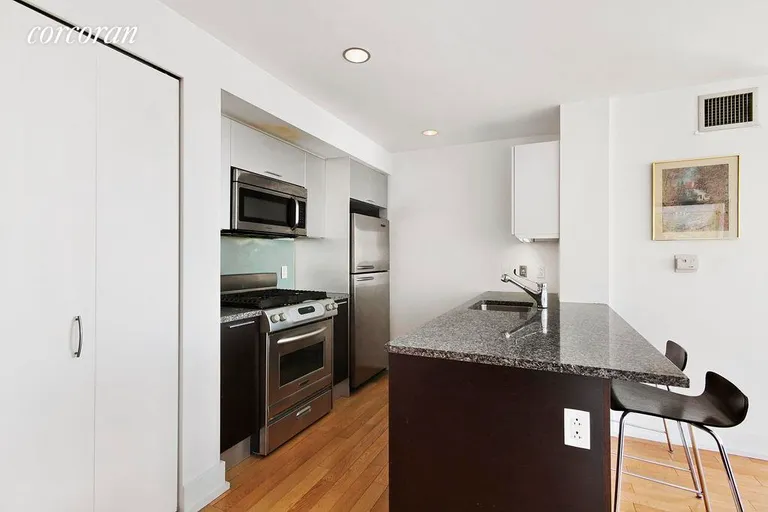 New York City Real Estate | View 350 West 42Nd Street, 27A | Open Modern Kitchen  | View 2