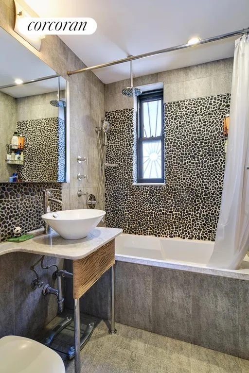 New York City Real Estate | View 225 East 74th Street, 6F | New spa-like stone bathroom | View 5