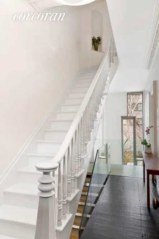 New York City Real Estate | View 300 State Street | Graceful stair; balcony overlooks garden | View 6