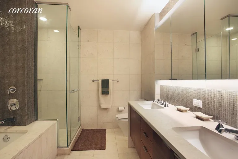 New York City Real Estate | View 70 Little West Street, 11A | Double Sink with soaking bath and walk in shower | View 4