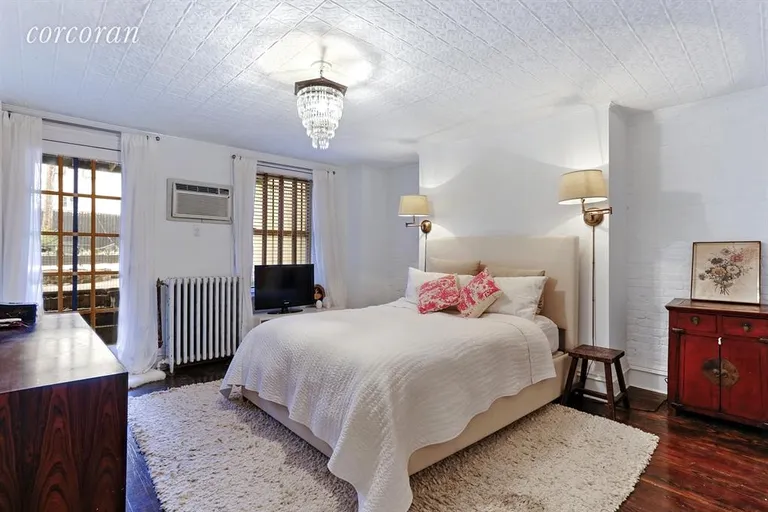 New York City Real Estate | View 355 Pacific Street | Lower Duplex master bedroom with  garden access | View 4