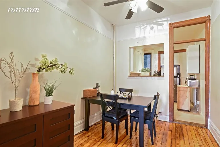 New York City Real Estate | View 1213 8th Avenue, 1L | Open, flowing dining room with pass through window | View 2