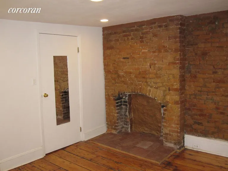 New York City Real Estate | View 200 Dean Street, 1 | Bedroom with decorative fireplace | View 5