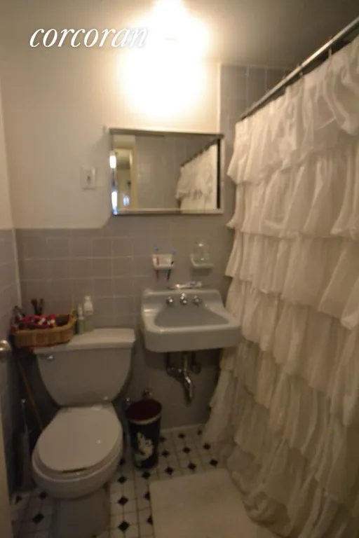 New York City Real Estate | View 38 West 69th Street, 3b | Renovated Bathroom
Washer/Dryer in Unit | View 5