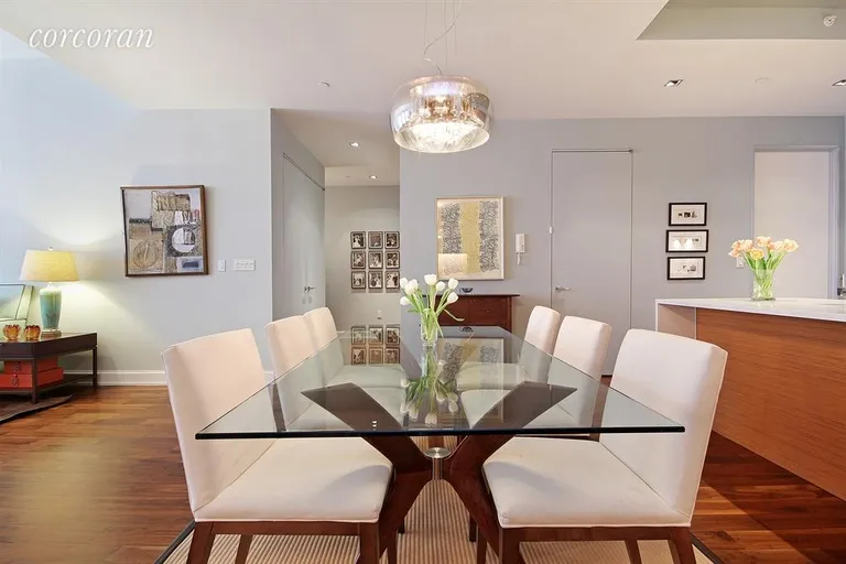 New York City Real Estate | View 140 West 22Nd Street, 7B | Open dining area accommodates any size table | View 2