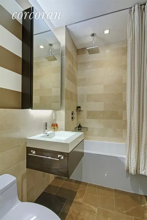 New York City Real Estate | View 140 West 22Nd Street, 7B | Second Bathroom has exquisite finishes | View 8