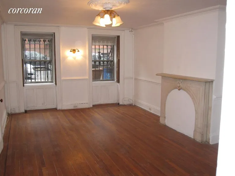 New York City Real Estate | View 169 Bergen Street, 1 | Decorative fireplace in large main room | View 2