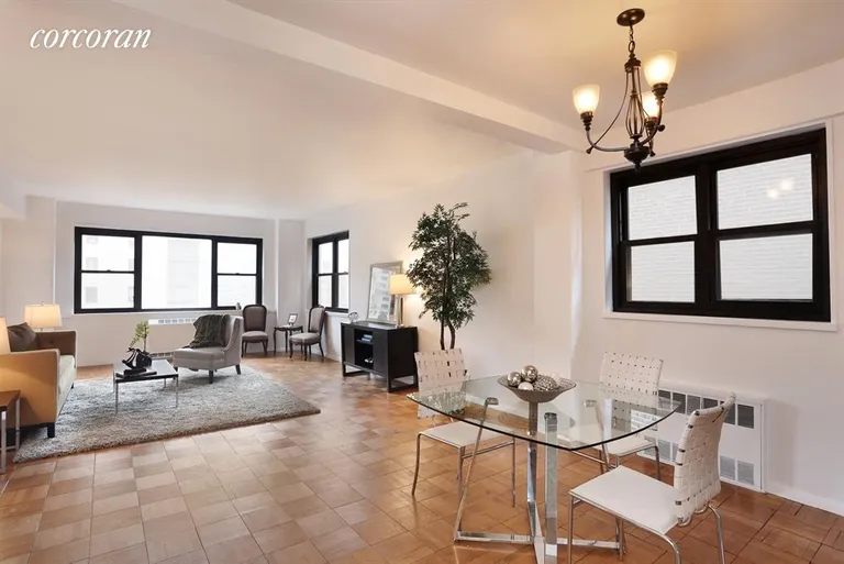 New York City Real Estate | View 165 East 72Nd Street, 14A | Windowed Dining Area leading to Living Room | View 2